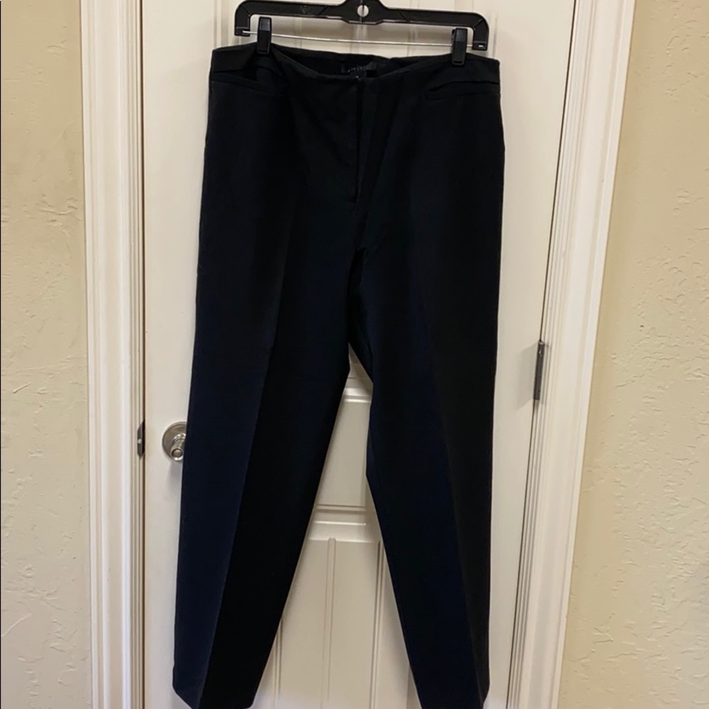 Black dress pants, pleated with peg leg ankles